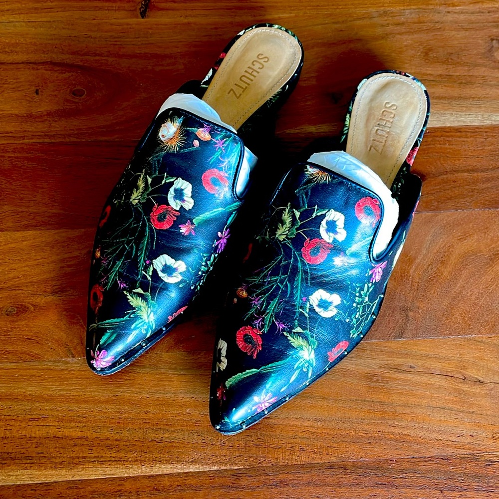 Mule slides by Shultz. Leather shoe with studded detail around the edge